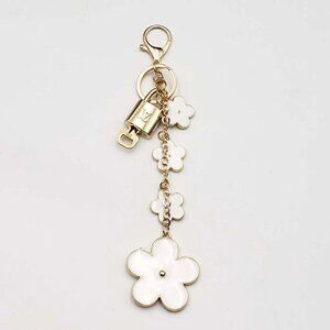 Authentic Louis Vuitton Lock & Key with unbranded Flower Bagcharm 010926